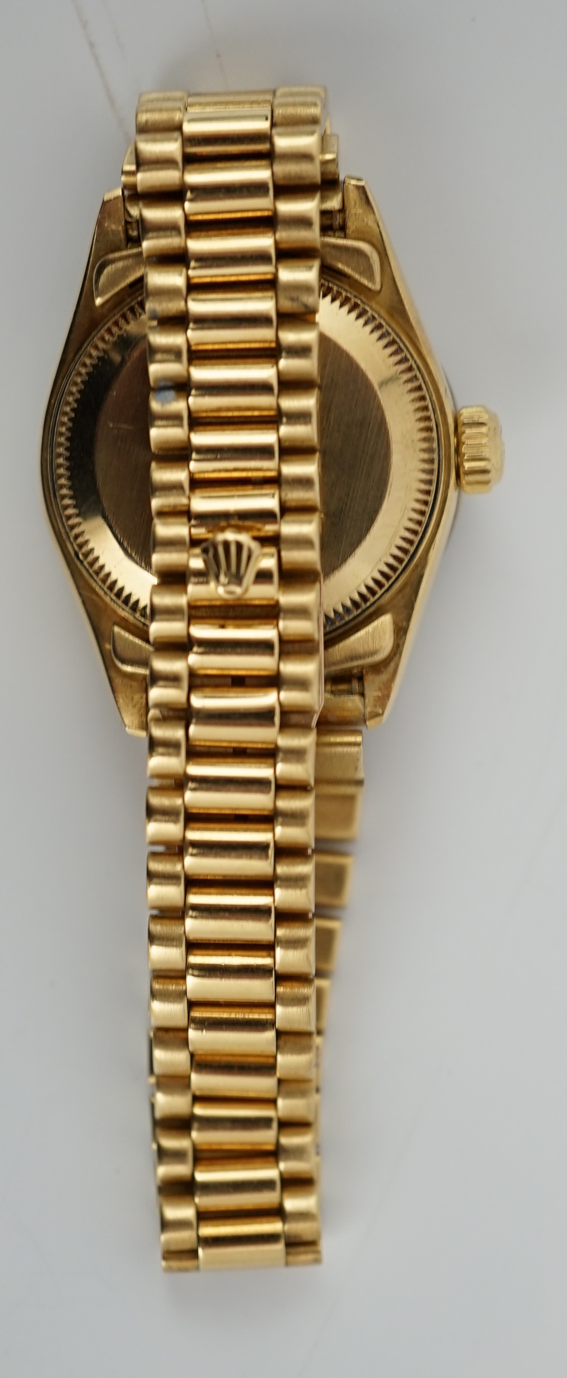 A lady's 1990's 18ct gold Rolex Oyster Perpetual Datejust wrist watch, with after market diamond set bezel